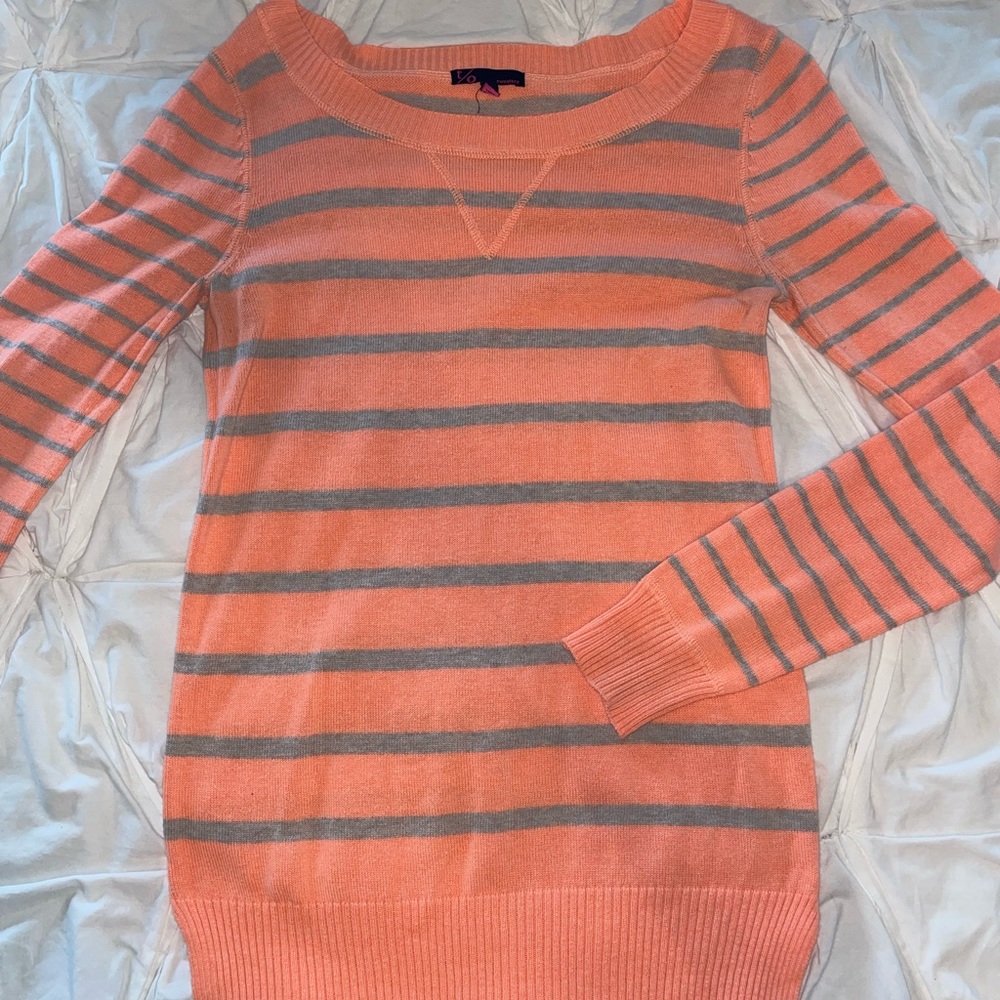Coral and gray sweater.